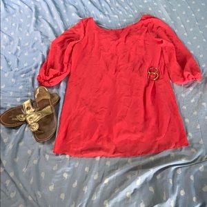 Red blouse with green low cut bow
